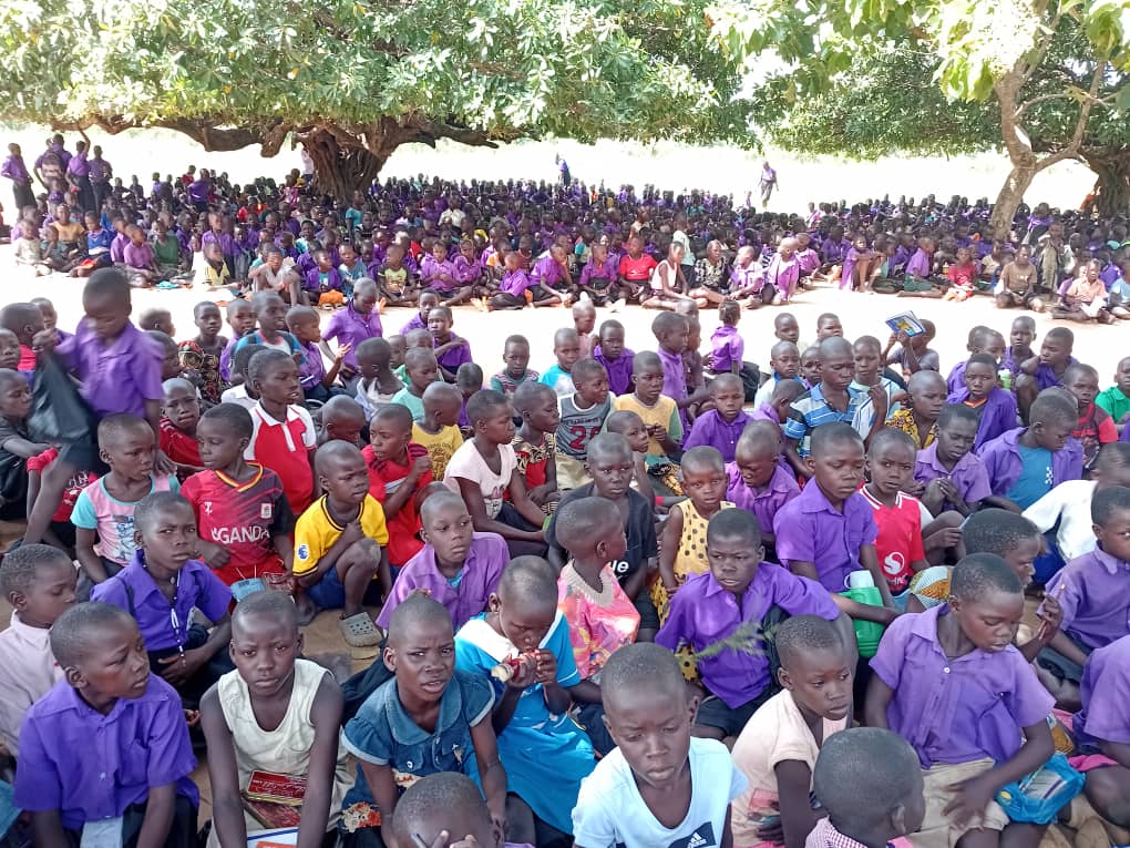 Large group of pupils gathered during school outreach