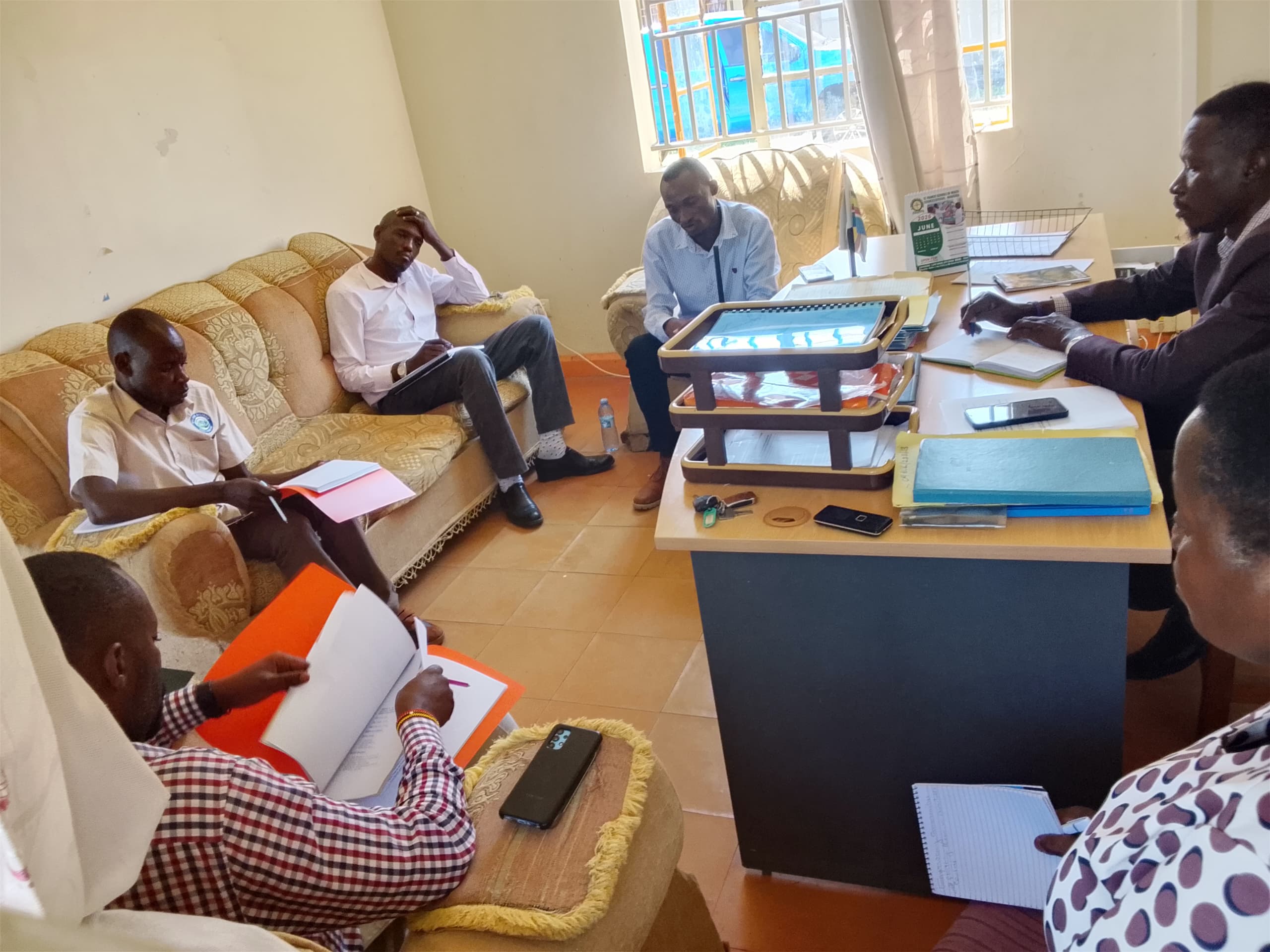 Mwesigwa CBO representatives and stakeholders in a planning meeting